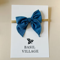 Basil Village Blue Bow Small 3x3 serged bow on nylon headband