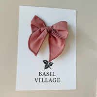 Basil Village Dusty Pink Bow Small 3x3 serged hem bow on clip
