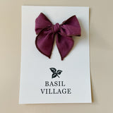Basil Village Plum Bow Small 3x3 serged hem bow on clip