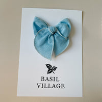 Basil Village Light Blue Bow Small 3x3 serged hem bow on clip