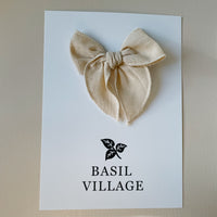 Basil Village Biscuit Bow Small 3x3 serged hem bow on clip