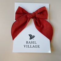 Basil Village Burnt Orange Bow Medium 5x5 serged hem bow on clip