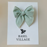 Basil Village Mint Bow Small 3x3 serged hem bow on clip
